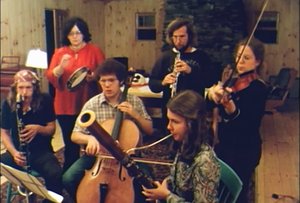 Musicians rehearsing the score