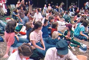 The audience gathered on the hillside